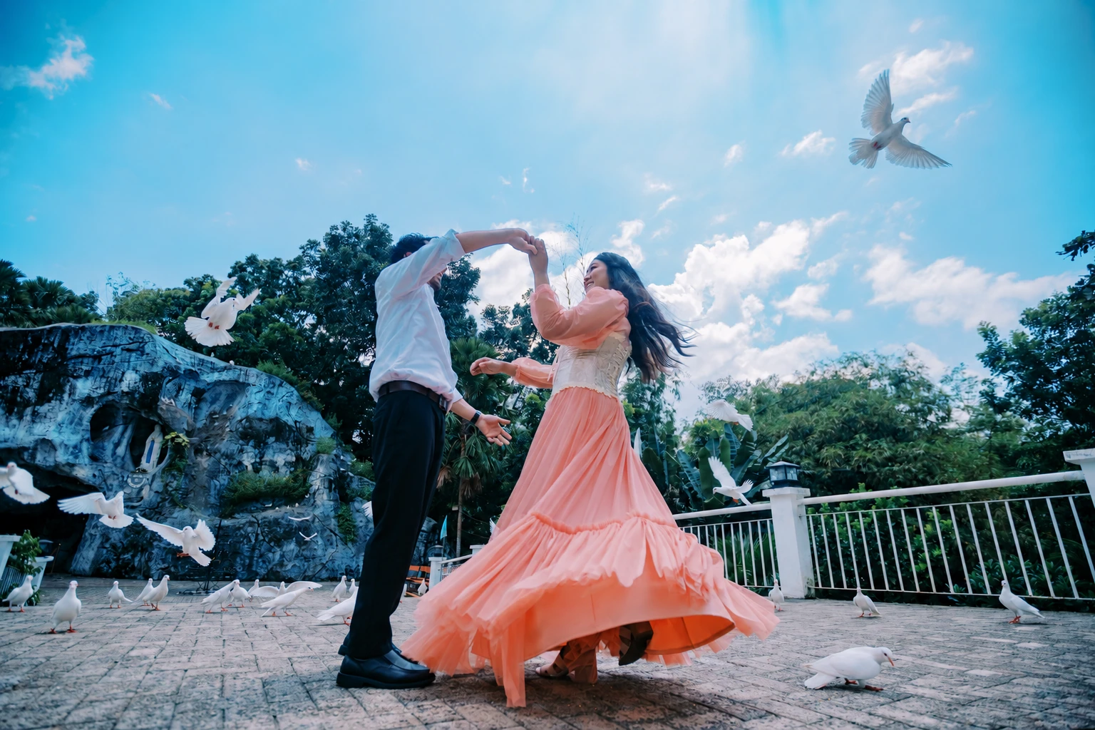A joyful twirl beneath a bright blue sky